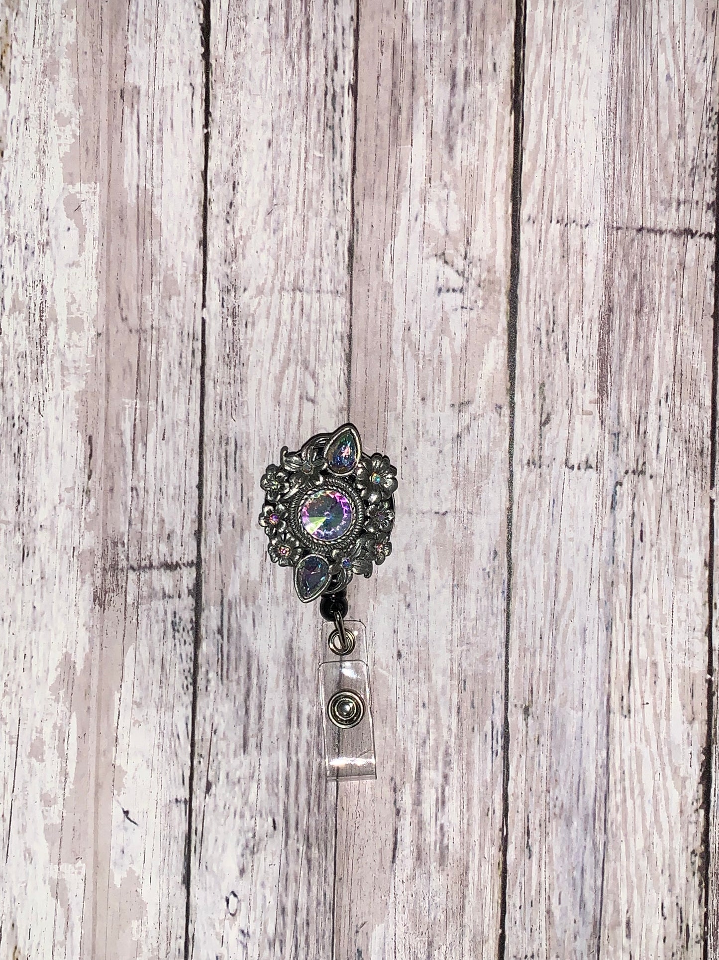 Bi-Point Flower Badge Reel