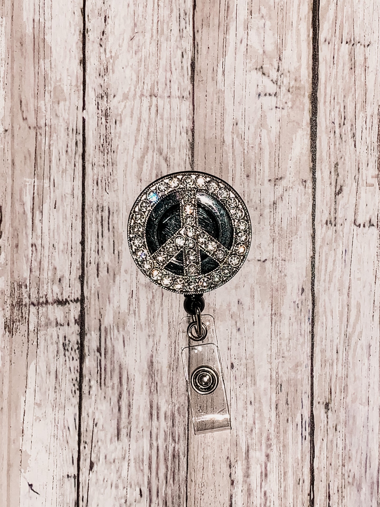 Rhinestone Peace Sign Badge Reel